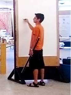 Photo of teen boy drawing