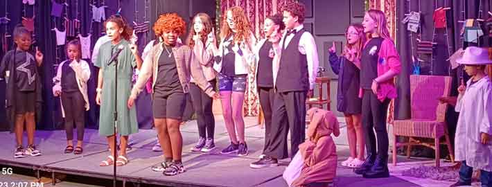 Kids on stage for Musical Theater Summer Camp.