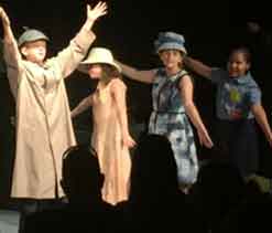Kids on stage showing off during Summer Camp.